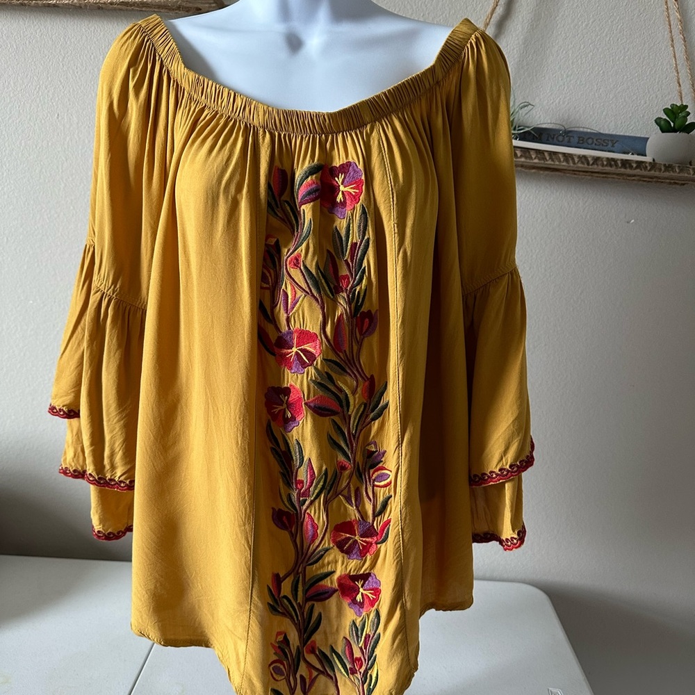 Butterfly sleeve off the shoulder top.
